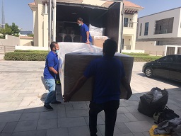 A team member unload matress